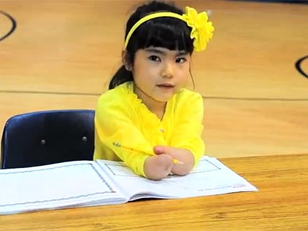 Penmanship Award Goes to the Girl Without Hands